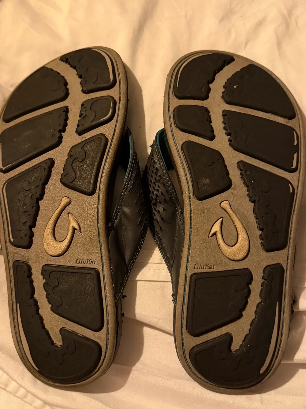 OluKai Men's Black Flip-Flops with Teal Accents